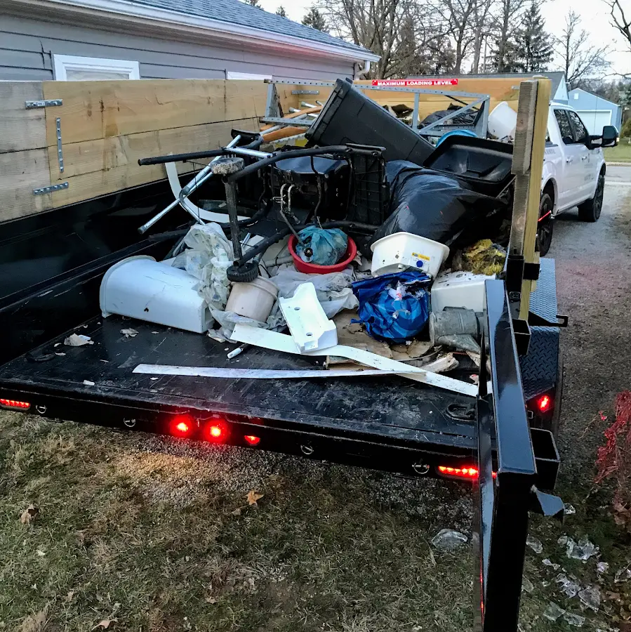 Roll-off dumpster delivered to a residential driveway in Simsbury