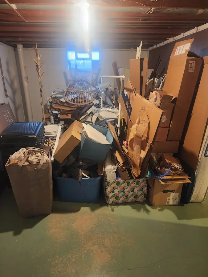 Roll-off dumpster container at job site for Yard Waste Dumpster Rental in Simsbury